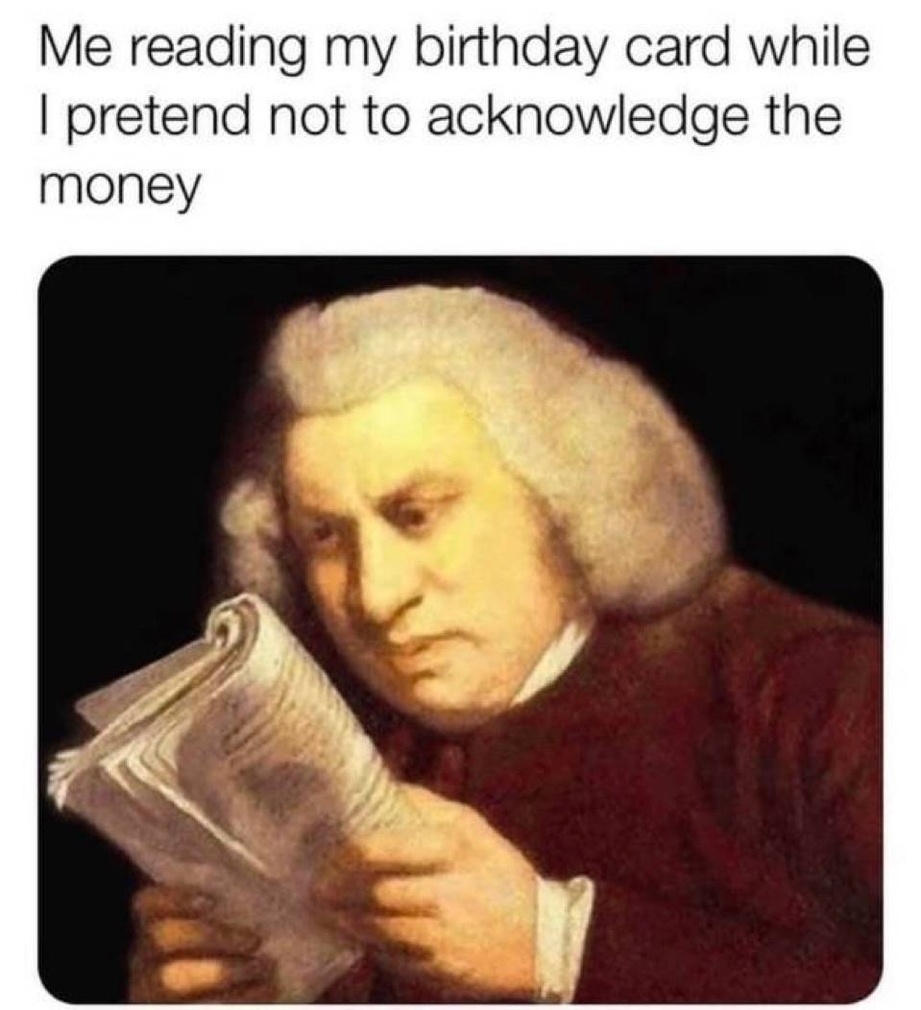 Me reading my birthday card while I pretend not to acknowledge the money