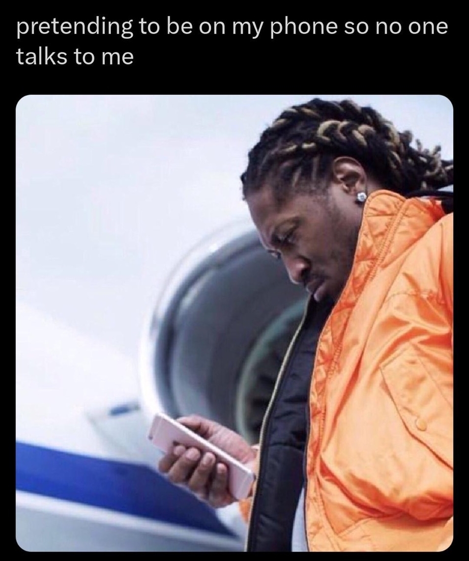 Pretending to be on my phone so noone talks to me – meme