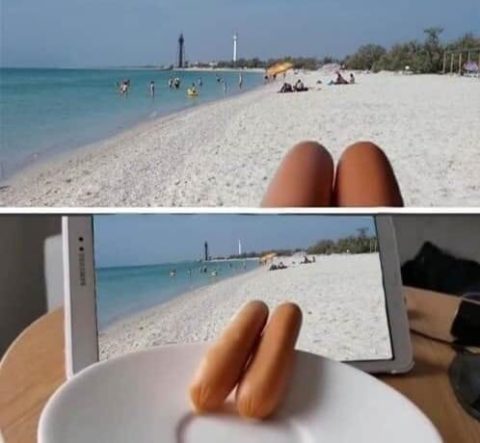 vacation photo fake sausage legs on the beach